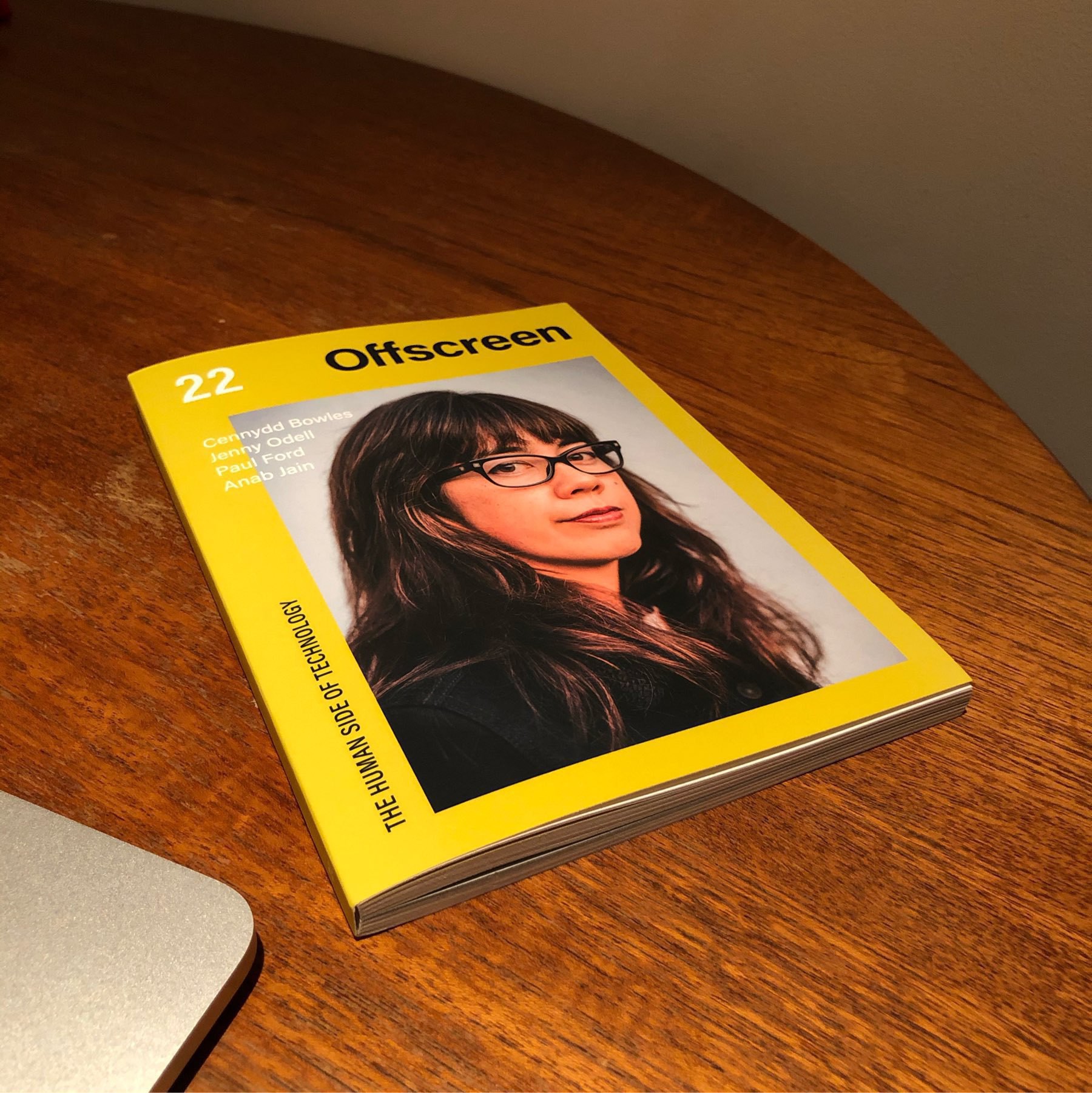 Offscreen magazine on top of brown table